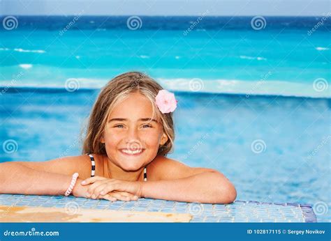 Smiling Girl Resting On The Edge Of Swimming Pool Stock Image Image