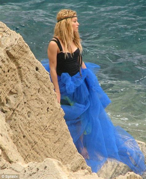 Find shakira blue's contact information, age, background check, white pages, divorce records, email known as: Shakira gets a helping hand after waves crashed over her photoshoot | Daily Mail Online