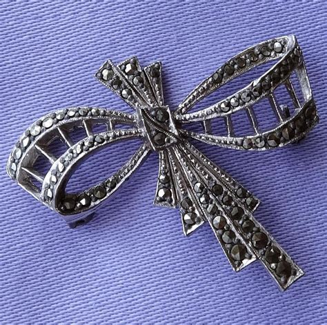 This Lovely Brooch Has A Wonderful Art Deco Style Ribbon Bow Design