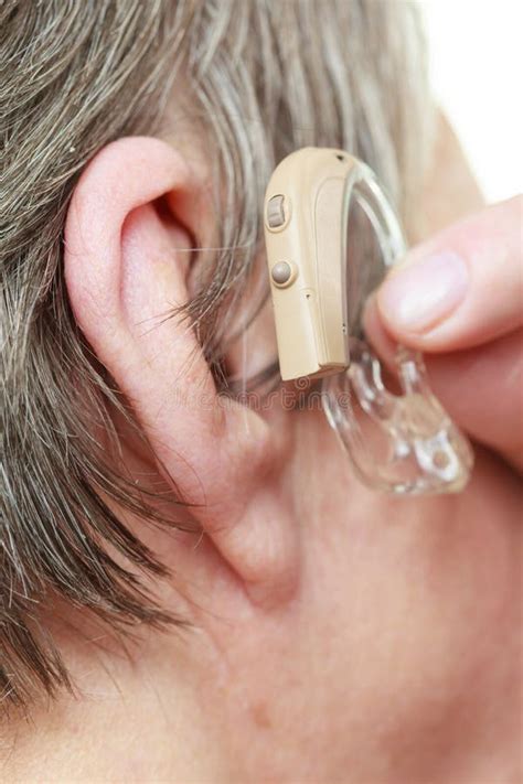 Closeup Senior Woman Using Hearing Aid Stock Image Image Of Hand Installing 96589411