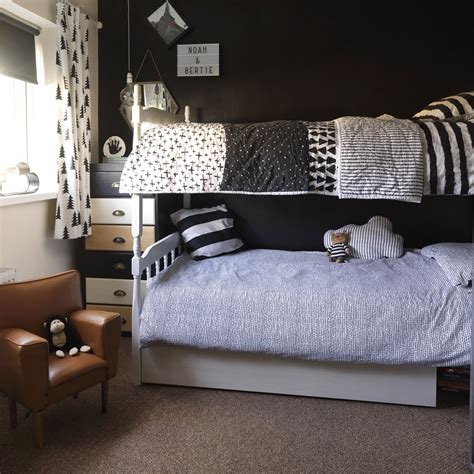 This boys bed features a bunk bed finished in navy blue paint, pairing up with the side table and shelving. Boy's bedrooms ideas - Boy's bedrooms - Bedrooms for boys