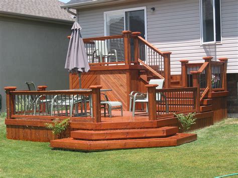 54 Beautiful Top Multilevel Decks Design For Your Backyard