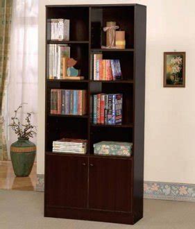 The bracket cut feet, framed door front, and antique pulls give a bring rustic charm to your home with the martin furniture motus bookcase with lower doors. Espresso Finish Modern Bookcase w/Two Doors & Shelves