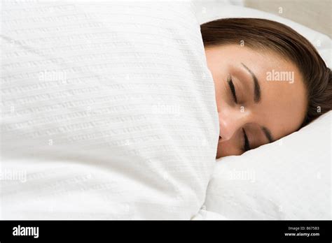 Woman Asleep In Bed Stock Photo Alamy