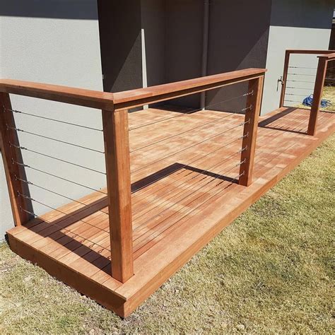 Height and spacing requirements, installation, and more. Merbau decking with a Merbau handrail and stainless steal ...