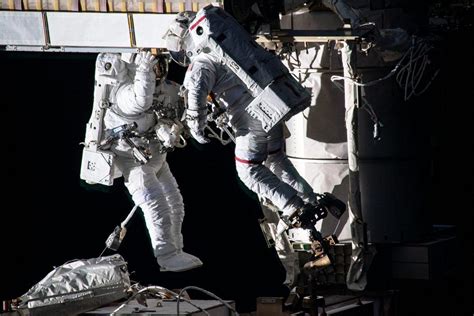 Spacewalking Astronauts Complete Second Roll Out Solar Array Installation On Space Station