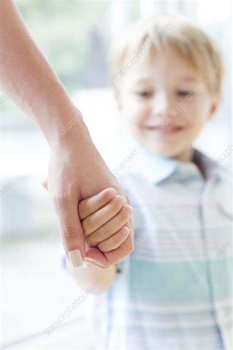 mother and son holding hands stock image f008 2206 science photo library