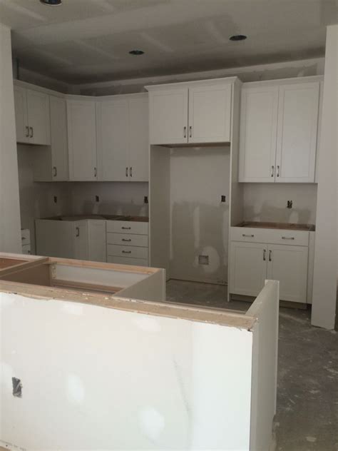 Painted harbor (13) painted ember glaze (9). White kitchen. Shaker style cabinets (Timberlake Sonoma ...
