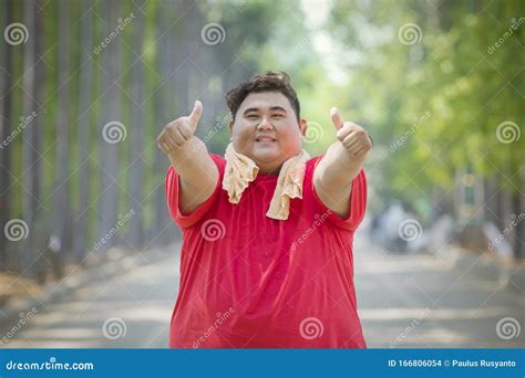 Portrait Of Fat Asian Man Doing Thumbs Up Pose Stock Photo Image Of