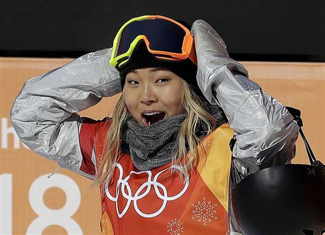 17 year old snowboarder chloe kim earns sweet success with gold medal in 1st olympic event ever