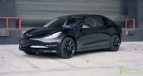 Blacked Out Tesla Model 3 Looks Set To Do A Drive By Shooting