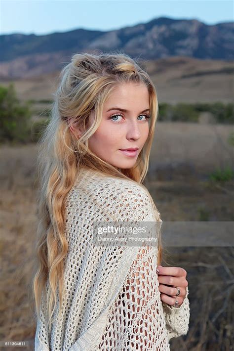 Blue Eyed Blond Teen Looking Over Shoulder Stock Photo Getty Images