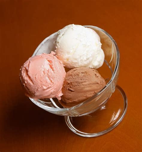 Three Scoops Of Chocolate Strawberry And Vanilla Ice Cream In G Stock Image Image Of Food