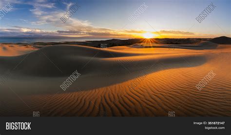 Sunset Over Sand Dunes Image And Photo Free Trial Bigstock