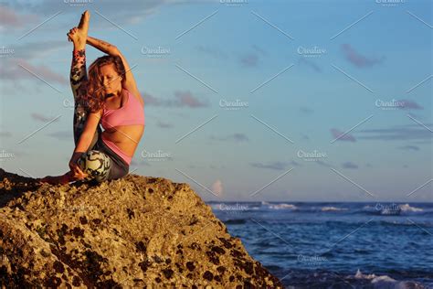 Woman Doing Yoga Exercise On Beach Containing Yoga Spa And Active High Quality Sports Stock