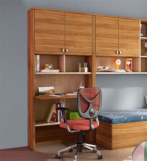 Study workstation table features stylish and fashionable design, which perfectly decorates your home and also adds a touch of bookshelf design: Buy Kosmo Oscar Study Table with Wall Storage by Spacewood ...