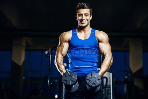 Fit Man Training Arm Muscles At Gym Stock Image Image Of Coach