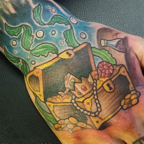embrace your inner pirate with these 15 treasure chest tattoos chest tattoo tribal sleeve