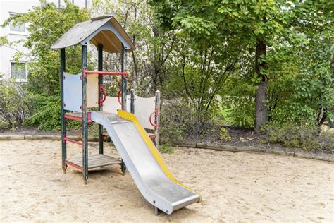 Modern Colorful Playground With Slides Swings And Other Children S