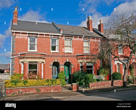 Row Of Red Brick Edwardian Semi Detached Houses England Stock Photo