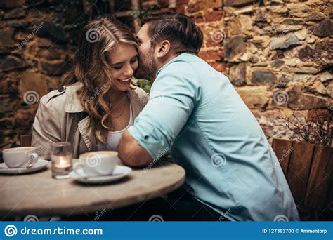 Romantic Couple On A Date Sitting In A Restaurant Stock Photo Image