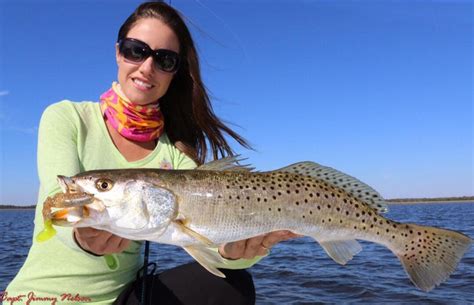 Luiza Shows Off A Nice Speckled Trout For More Information On This