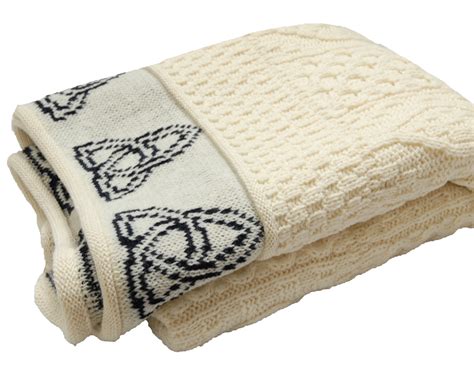 First, tie a knot at the very end of the piece of yarn you are working with. Aran Cable Knit Blanket Throw Trinity Knot Design Kerry ...