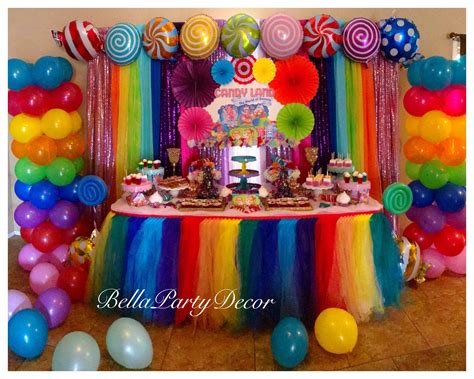 Secure the end with a pin, and. Candyland dessert table with two balloon columns rainbow ...