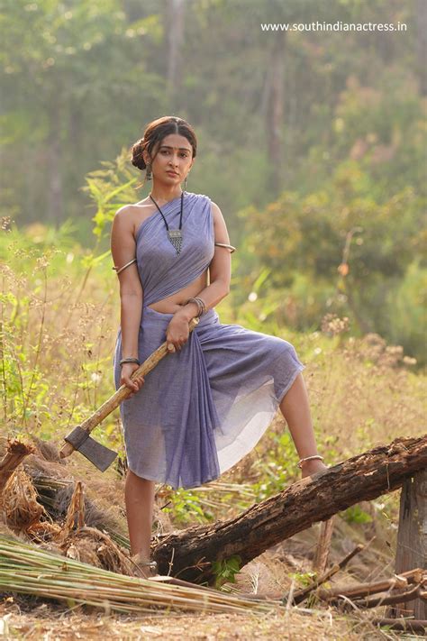 Farnaz Shetty Stills In Blouse Less Saree From Induvadana Movie