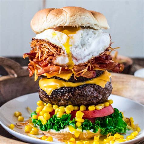 Drop us a dm to talk about your food. Brazilian Epic Burger with Egg - Olivia's Cuisine