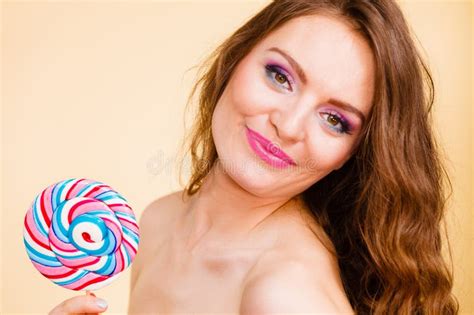 Woman Holds Colorful Lollipop Candy In Hand Stock Image Image Of Attractive Dessert 104100801