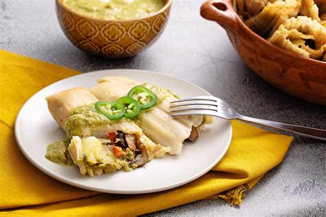 How to shop your entire thanksgiving meal at whole foods and feed your whole family for no more than $160. Vegan Mushroom Tamales with Green Mole