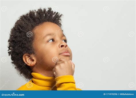 Little Clever Curious Black Child Boy Thinking On White Background