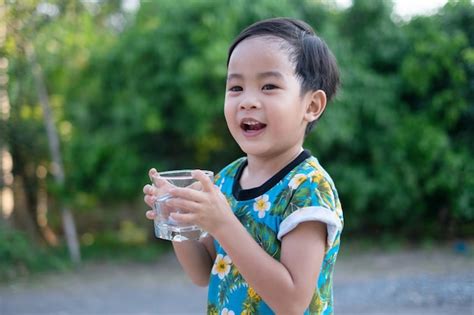 Premium Photo Asian Cute Boy Drinking Water For Healthy And Refreshing