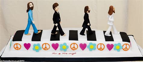 Sixties Music Fans Marry In Beatles Themed Wedding Abbey Road Cake