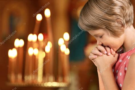Little Girl Praying In Church Stock Photo By ©billiondigital 118710546