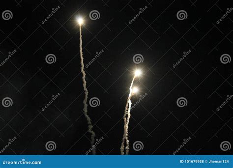 Three Flares Shooting Up Into The Night Sky Stock Photo Image Of