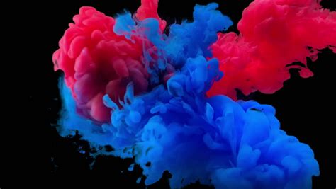 Red and blue mix color logo. Colorful Paint Drops Mixing in : video stock a tema (100% ...