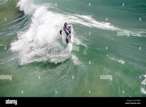 Huntington Beach, USA. 30 July, 2017. South African surfer Matthew