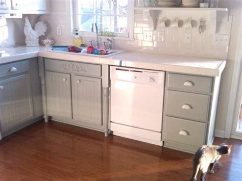 :) i helped refinish these old kitchen. Remodelaholic | Painting Oak Cabinets White and Gray