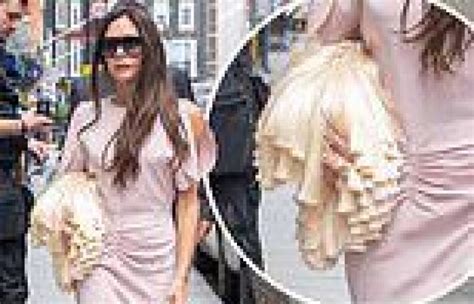 Victoria Beckham Displays Her Svelte Frame In A Pink Midi Dress And
