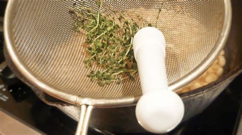 Get Fresh Herbs Off The Stems With A Mesh Strainer