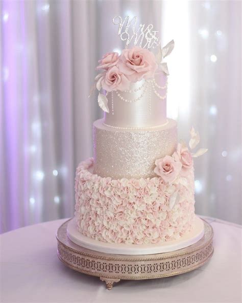 blush pink and silver wedding cake with ruffles and sparkle sparkle bakes romantic wedding