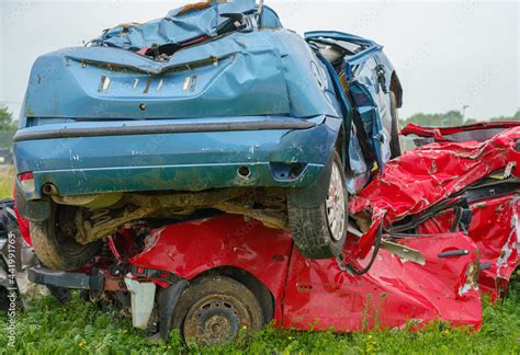 The Crushed Remains Of Two Cars After A British Army Fv Challenger