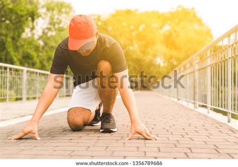 Athlete Man Running Start Pose Stock Photo 1356789686 Shutterstock