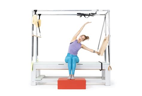 Seated Mermaid With Push Thru Bar On The Cadillac Online Pilates Classes