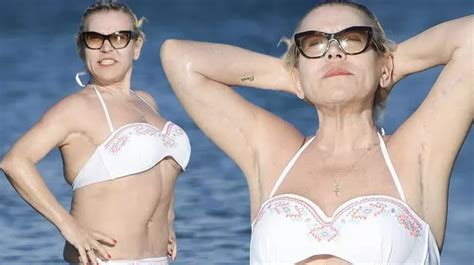 Tina Malone Proudly Shows Off Her Bikini Body As She Cools Off In The