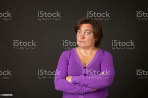Studio Portrait Of A 40 Year Old Woman Stock Photo Download Image Now
