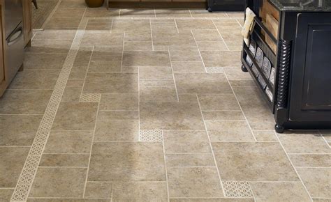 Installing tile on your kitchen floors is always a smart, stylish decision. stone tile kitchen floor - Google Search | Floor tile design, Tile floor, Kitchen floor tile