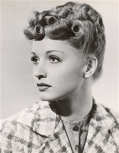 It's a hairdo that rebelled against the perfectly coifed and curled looks of the time. Talking about 1940s Hairstyles... - Verity Vintage Studio